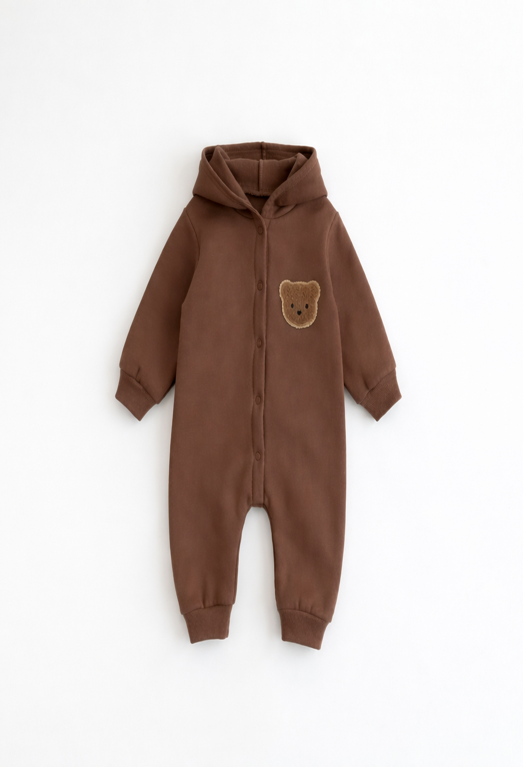 Brown baby onesie with a bear patch on a white background