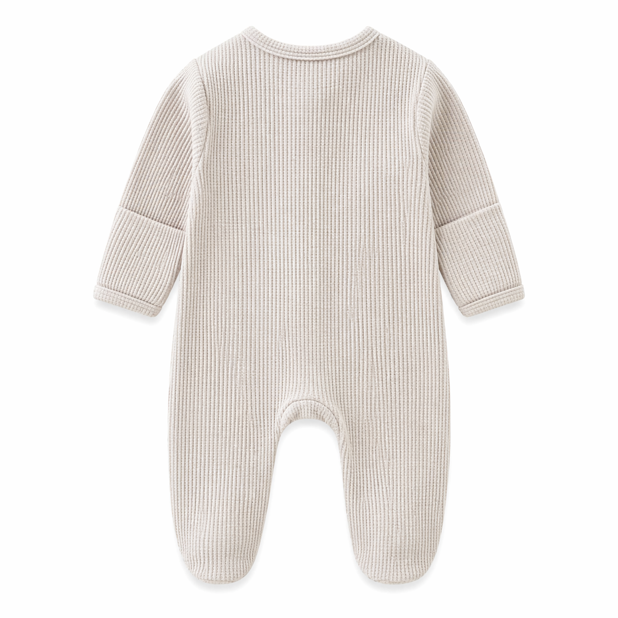 Light grey baby onesie with a zipper on a beige background with a green leaf