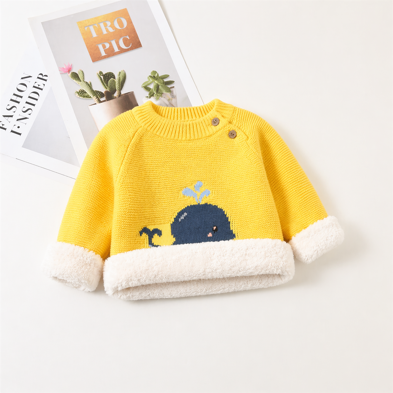 Yellow sweater with shoulder buttons