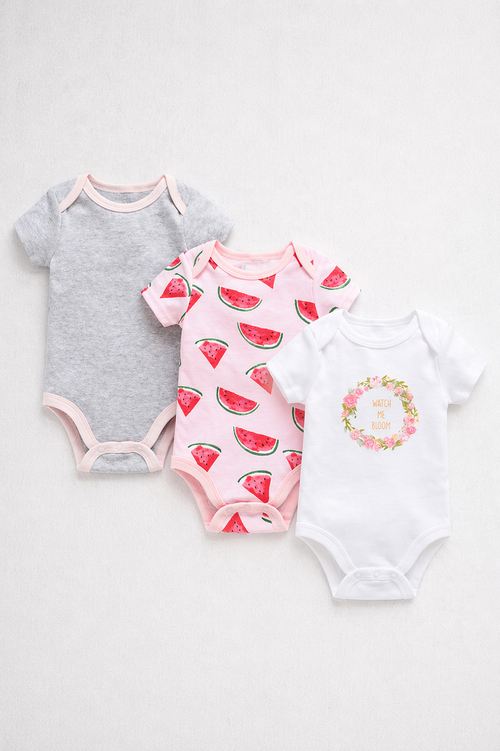Three baby bodysuits with watermelon designs on a white background