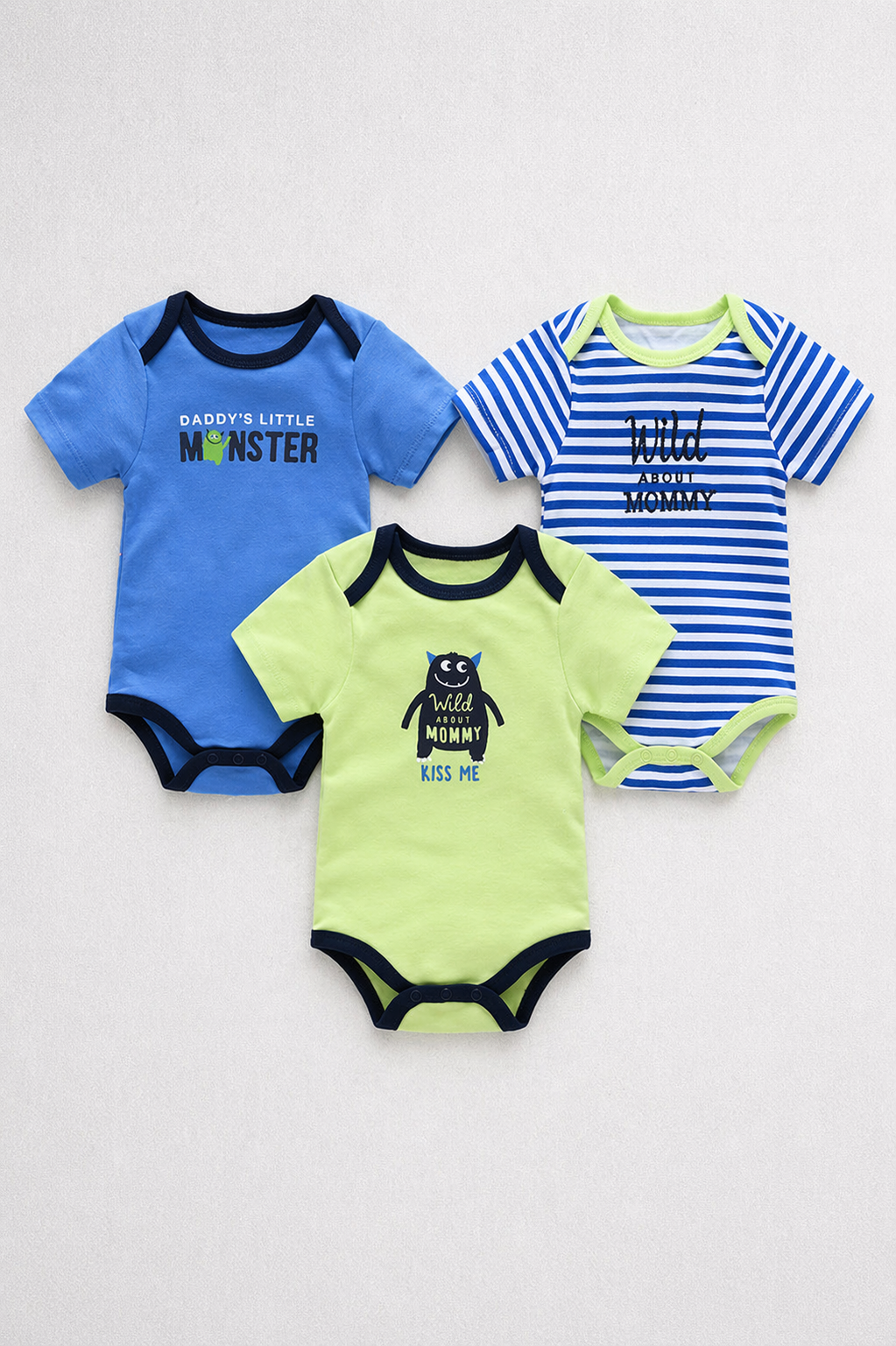 Three blue baby alien bodysuits with text designs on a white background