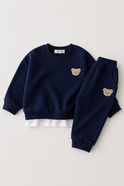 Navy blue sweatshirt and pants set with bear embroidery on a white background