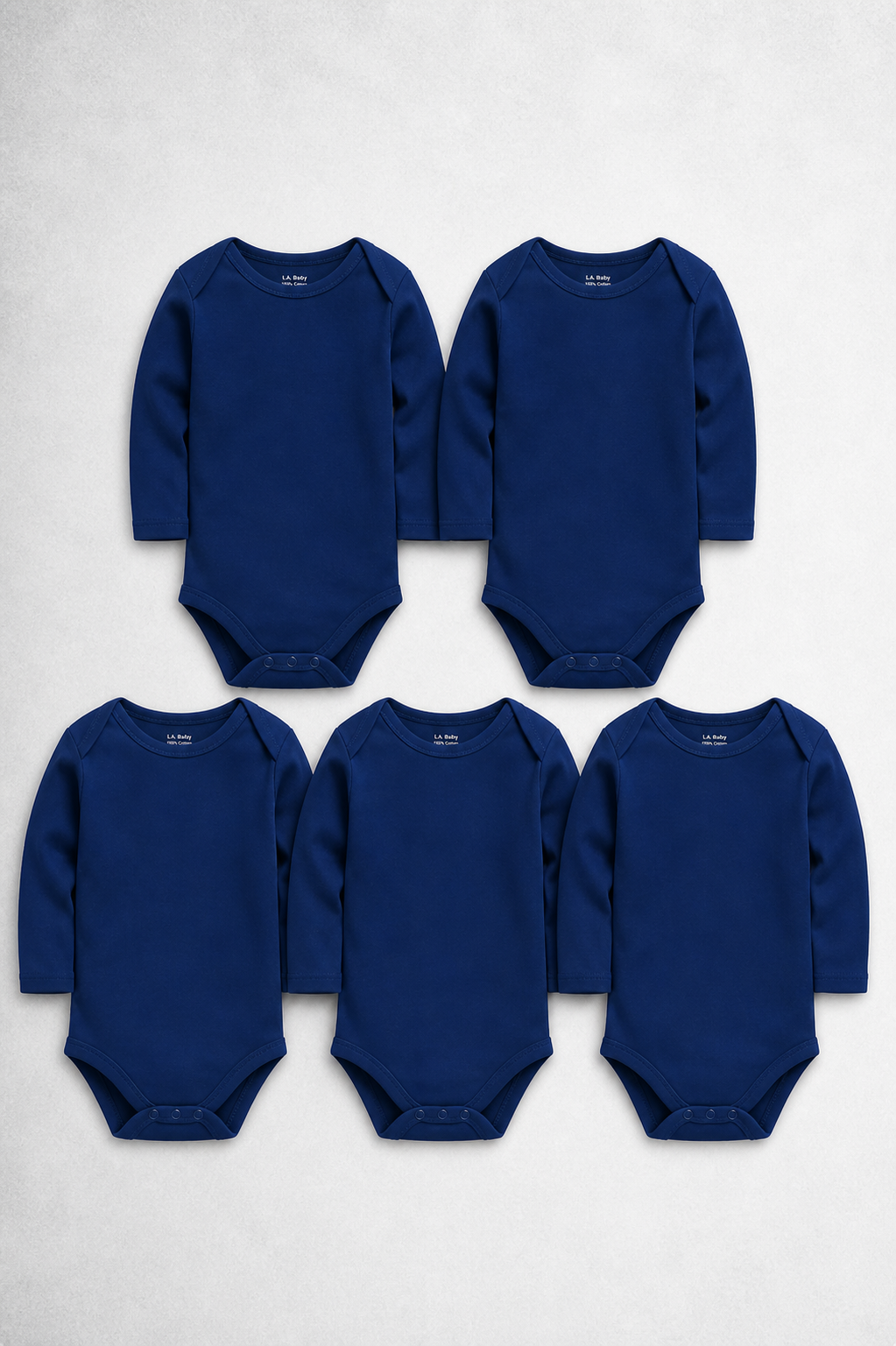 Five navy blue baby rompers arranged in a pyramid formation on a white 