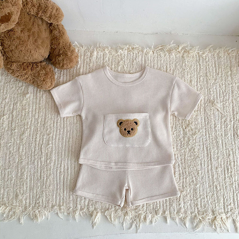 Children's off-white outfit with teddy bear design