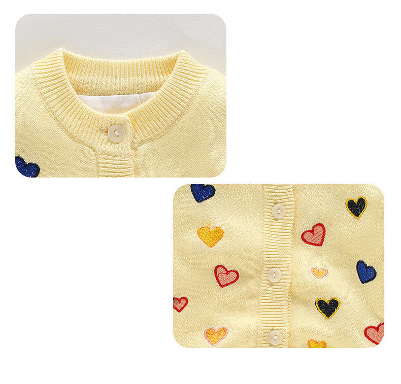 Yellow cardigan with heart design